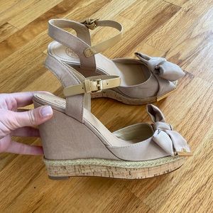 Tory Burch— never worn wedge sandals. Size 6.5. True to size.